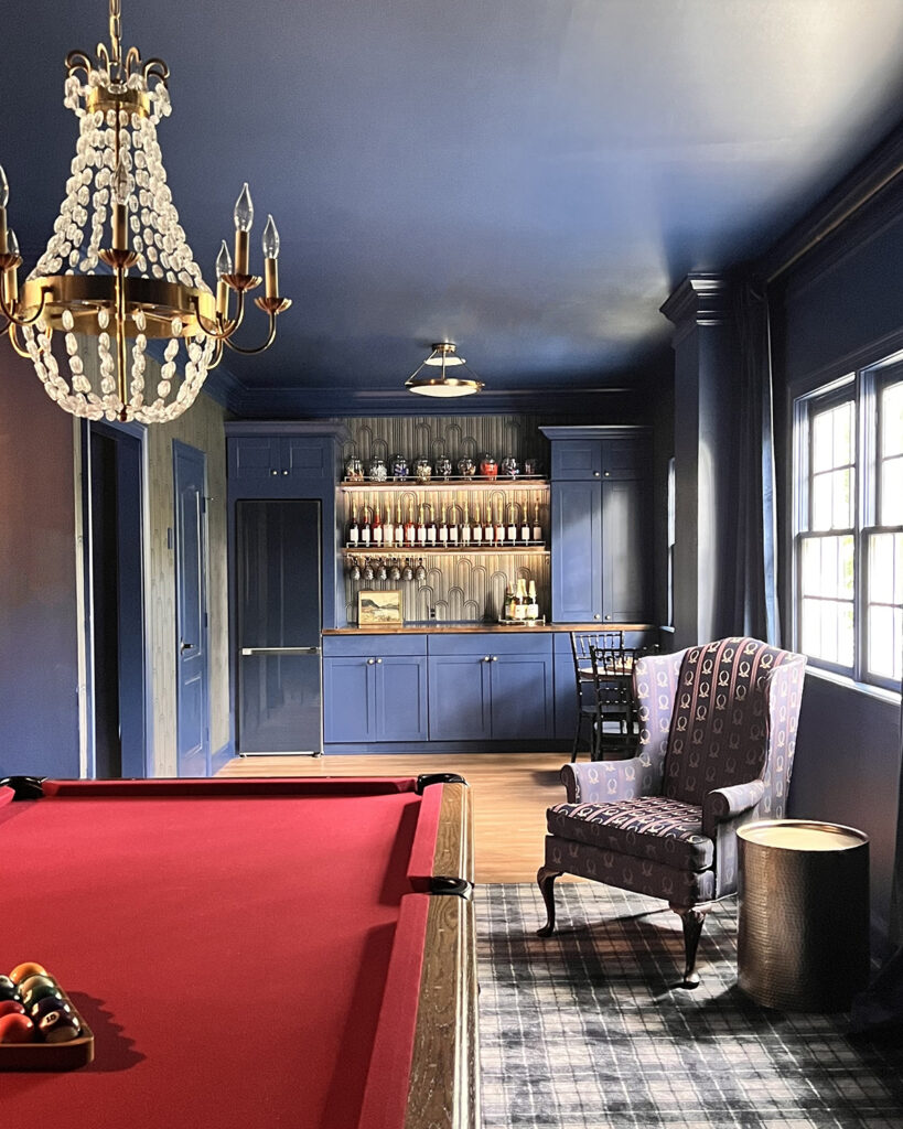 Best blue paint colors: navy blue billiard room using Behr Compass Blue