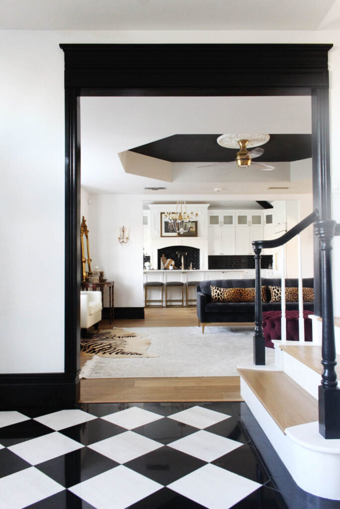 Painted Trim With Black And White Accents In Entryway