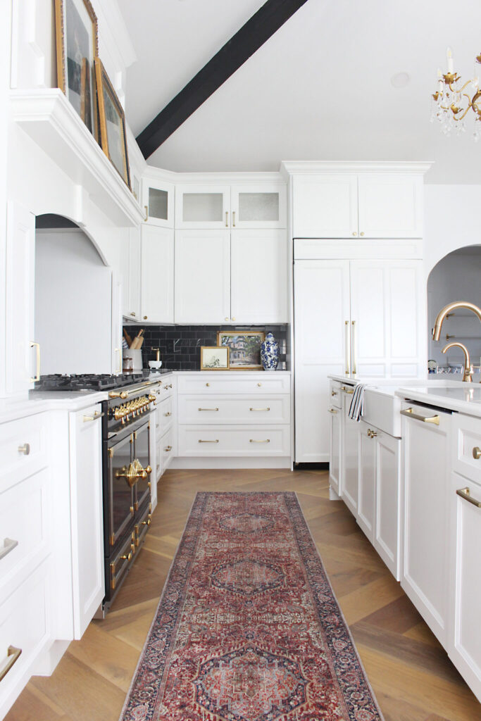 All White Kitchen With Neutral Floors