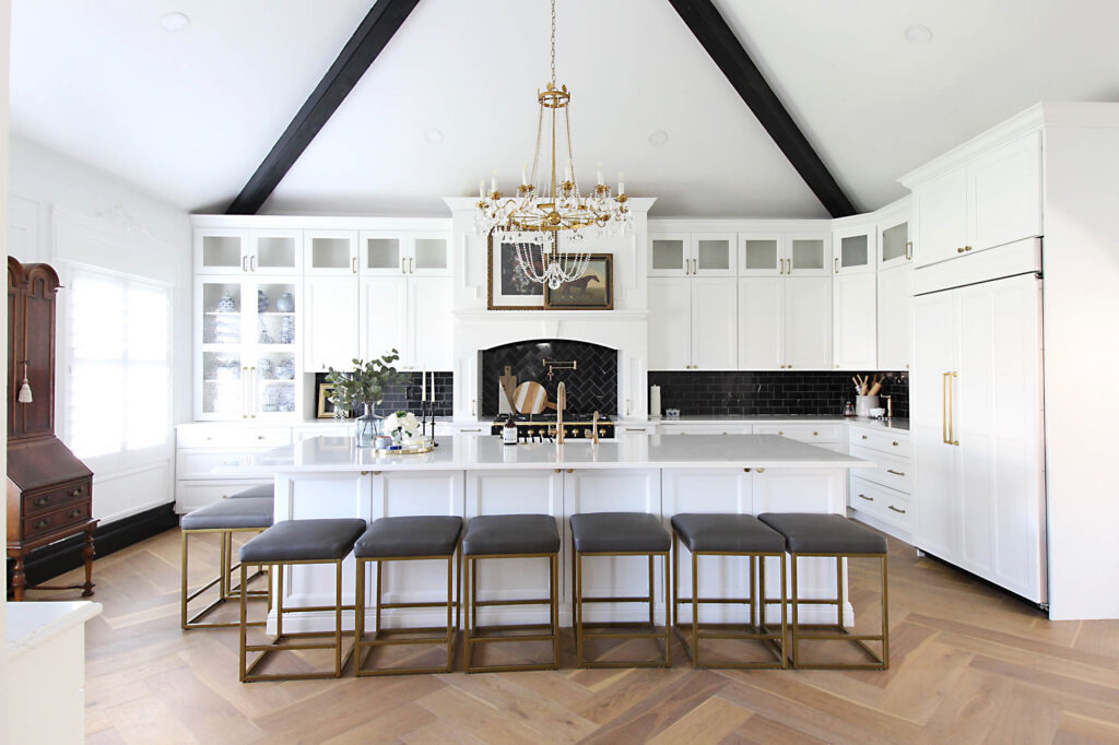 All White Kitchen With Herringbone Floors