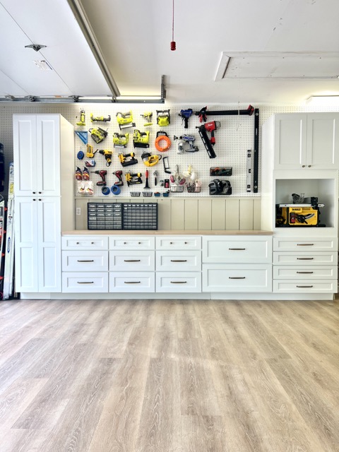 Light wood flooring in garage workshop