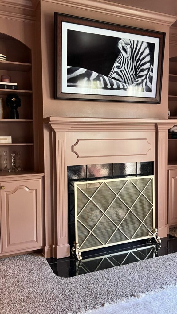 Pink Built-In Cabinets And Fireplace